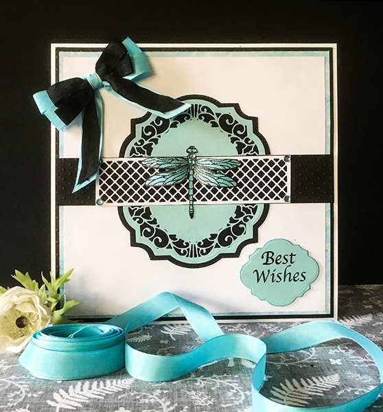 Black, white and teal dragonfliy layered card
